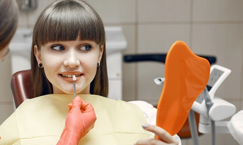 women getting dental crown treatment